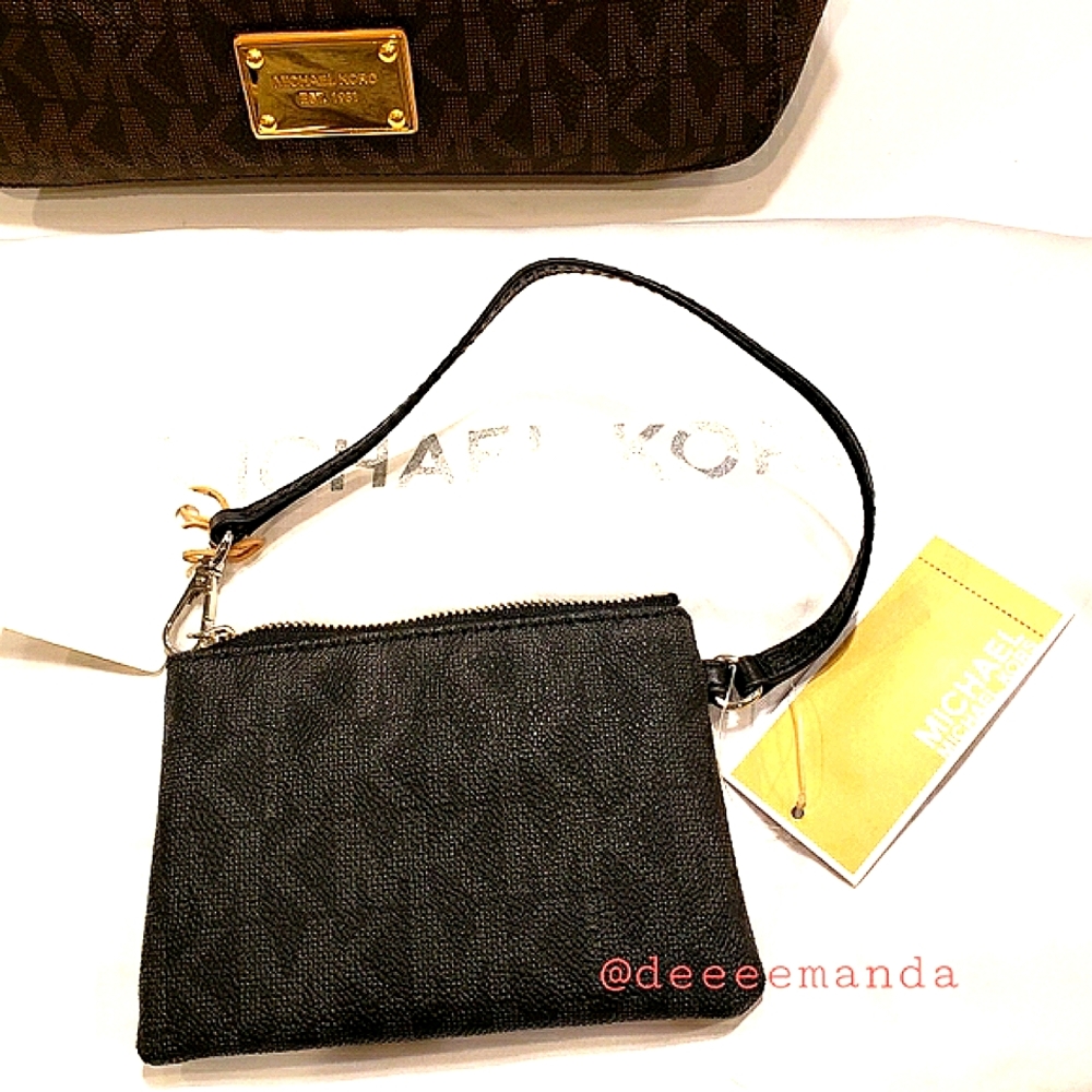 NEW Michael Kors Monogram Wristlet black-Grey Chrome tone Hardware. Never worn.